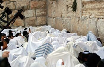 Jews in white at the Western Wall