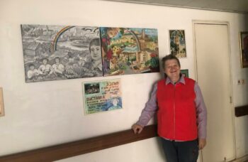 Tanya stands alongside her double painting.