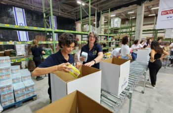 ICEJ staff packing food items