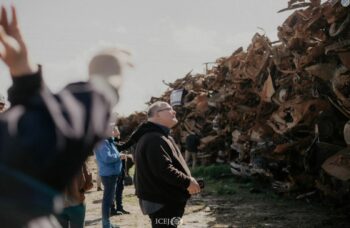 Delegates overwhelmed by site of burned cars