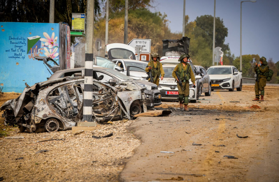 Cars piled up at entrance to Kibbutz Alumim