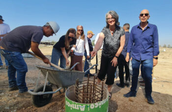 ICEJ Vice President of AID & Aliyah Nicole Yoder at the ground-breaking ceremony to rebuild Kibbutz Be’eri.