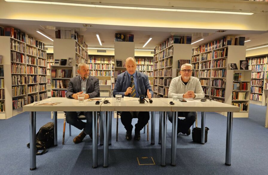Mojmir Kallus (L to R), Vatroslav Župančić and Boris Havel in the public library. 