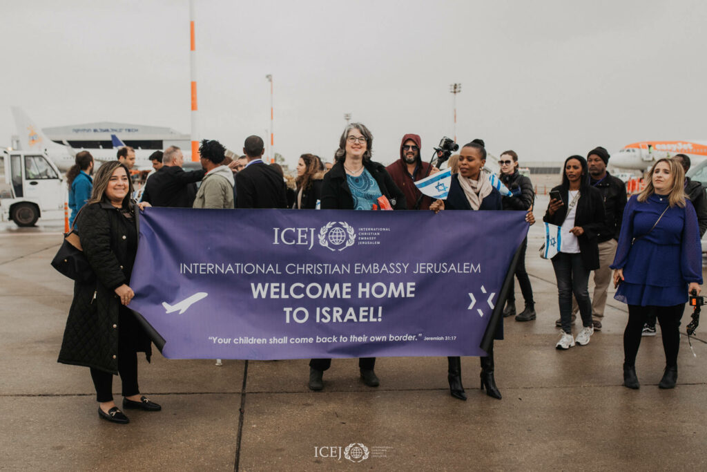 ICEJ staff members welcome new immigrants at Ben Gurion Airport.
