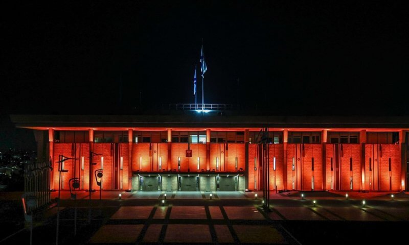 The Knesset is lit in orange on the eve of the Bibas funeral. (Credit: Knesset Spokesperson/GPO)