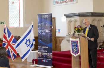 Main photo: ICEJ-UK National Director Dr David Elms speaks at the meeting in Edinburgh.