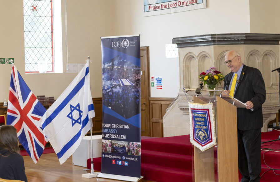 Main photo: ICEJ-UK National Director Dr David Elms speaks at the meeting in Edinburgh.