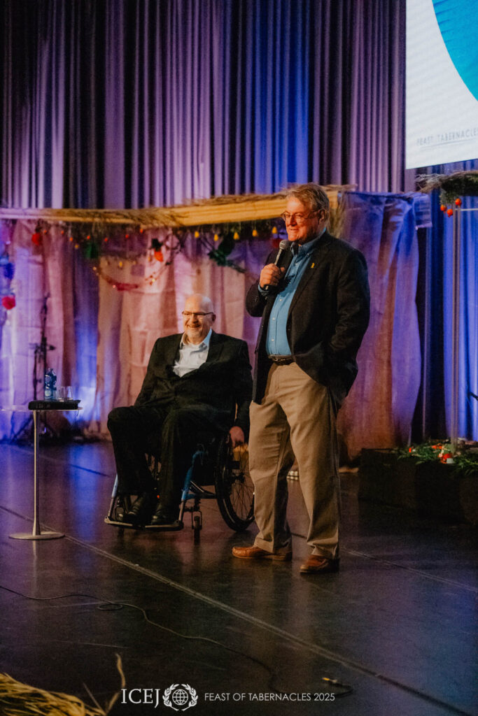 ICEJ President Dr. Jürgen Bühler and Senior Vice President David Parsons address the Pilgrims.