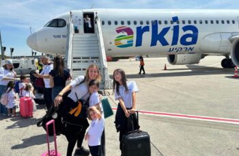 A French family arrives on an ICEJ-sponsorted flight in July