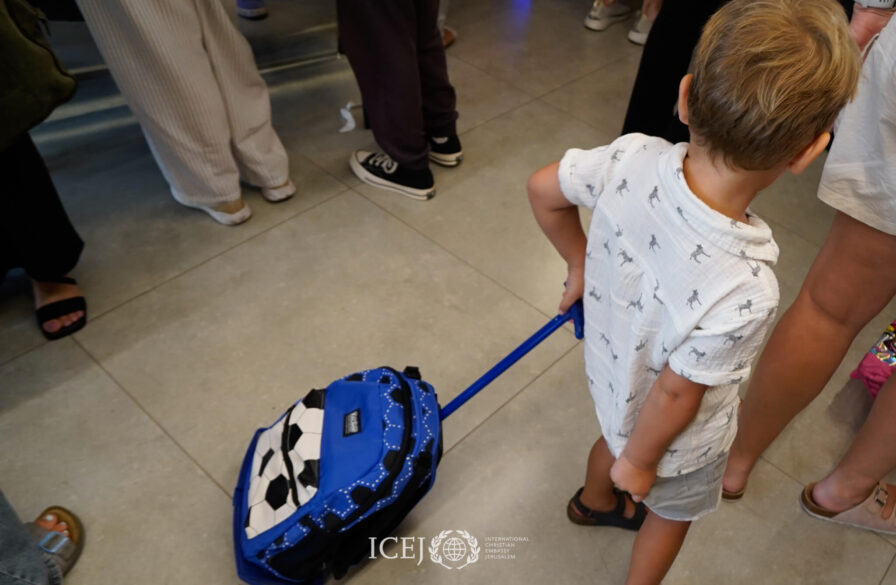 child walks with Backpack